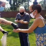 people being handed ladybugs