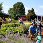 family in the garden with mausoleum in the distance