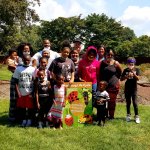 group of people posing for a group photo