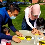 people doing a honey bee craft