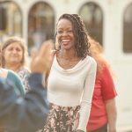 woman smiling outside