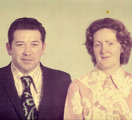 Old photo of a married couple man and woman in formal clothing