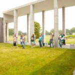 photo of people walking through a monument building