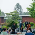 jazz band performing for an audience outside