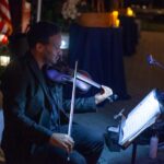 man playing the violin