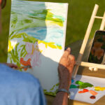 close up of a painting on a canvas of a landscape